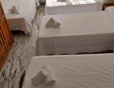 Quadruple Room with Private Bathroom