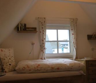 Four-Bedroom Apartment with Balcony 