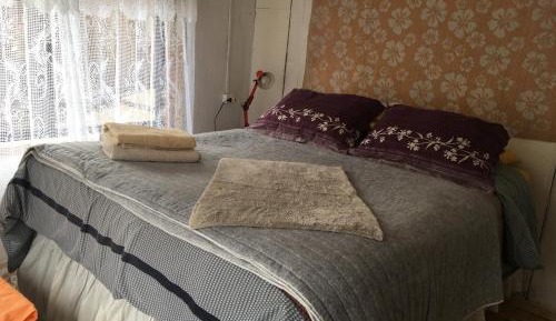 Queen Room with Shared Bathroom