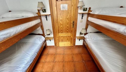 Economy Quadruple Room with Shared Bathroom