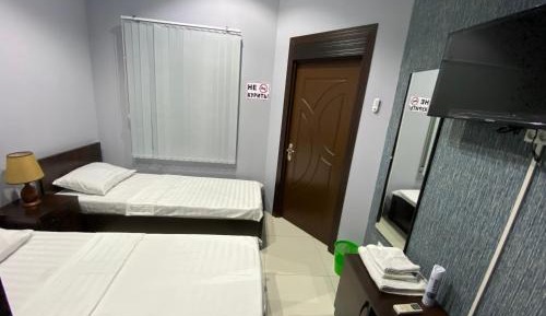Twin Room with Shared Bathroom