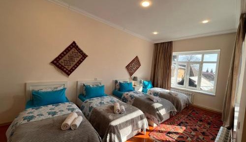 Quadruple Room with Private Bathroom
