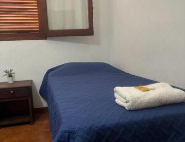Single Bed in Dormitory Room