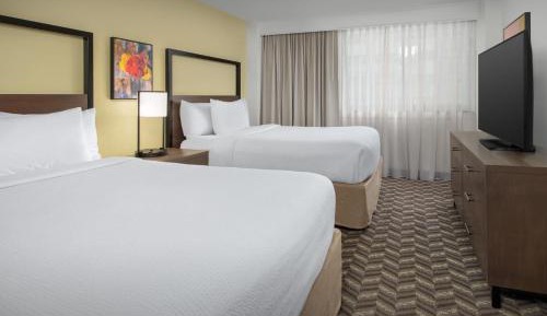 Queen Suite with Two Queen Beds and Sofa Bed