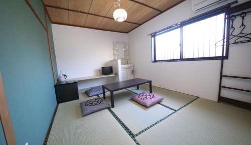 Quadruple Room with Shared Bathroom