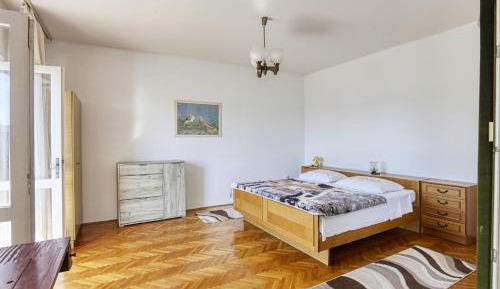 Three-Bedroom Apartment with Balcony and Sea View