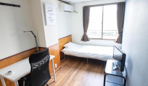 Single Room with Shared Shower and Toilet