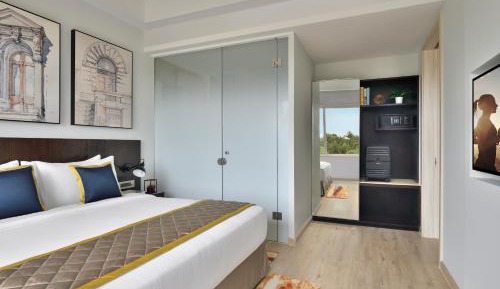 One Bedroom Deluxe - Enjoy Complimentary Hi-Tea Service with a Live Snack Counter from 4 PM to 6 PM   