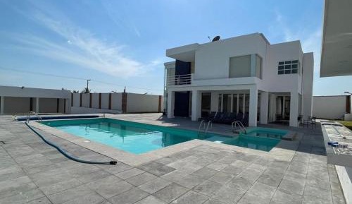 Six-Bedroom House