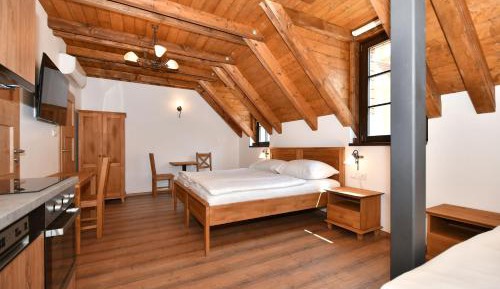 Three-bed studio with kitchenette
