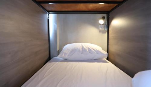 Single Bed in Dormitory Room
