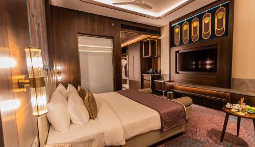 Premier Room 15% Discount on Food and Soft Beverages , SPA , Saloon and Laundry(only washing and Ironing)