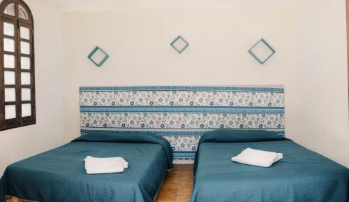 Quadruple Room with Shared Bathroom