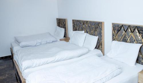 Economy Quadruple Room with Shared Bathroom