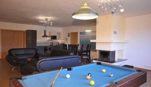 Three-Bedroom Apartment with Fireplace and Billiards