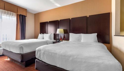 Queen Suite with Two Queen Beds and Sofa Bed