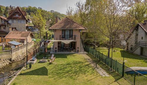 Villa with Balcony and River Views