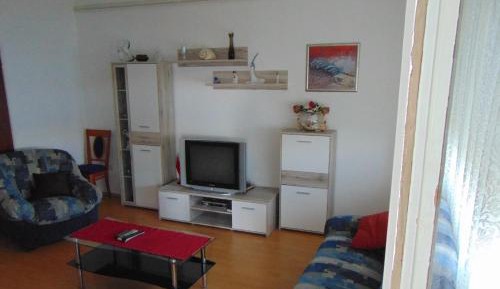Three-Bedroom Apartment with Balcony and Sea View