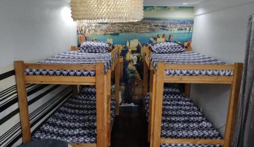 Quadruple Room with Private Bathroom