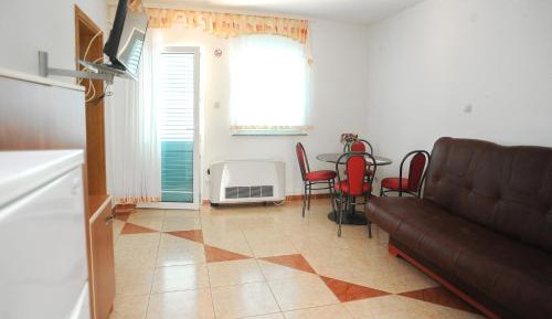 One-Bedroom Apartment with Balcony and Sea View