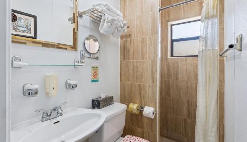 Deluxe Efficiency Suite: 2 Double Beds and 1 Sleeper Sofa