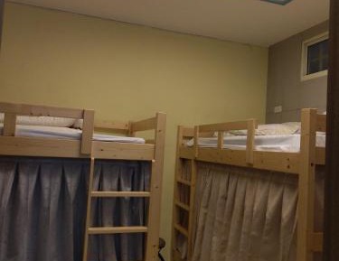 Single Bed in Dormitory Room