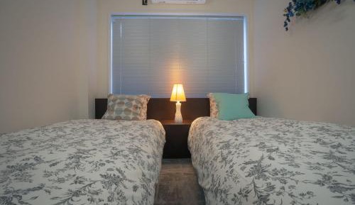 Twin Room with Shared Bathroom