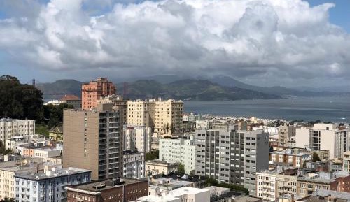 Corner King Room with City View