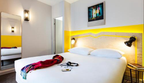 Standard Triple Room with 2 Single Beds and Sofa Bed