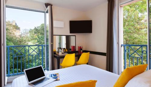 Appartement 1 chambre avec 1 lit double et 2 lits simples