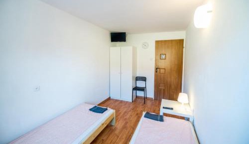 Small Twin Room with Shared Toilet