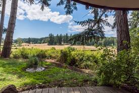 Mayne Island House | Picturesque and unique cob home on organic farm
