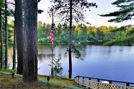 Waterboro House | Perch on Lake Sherburne Sleeps FOUR. Waterfront Lake House with Dock Makes a Great Home Base for Daily Excursions