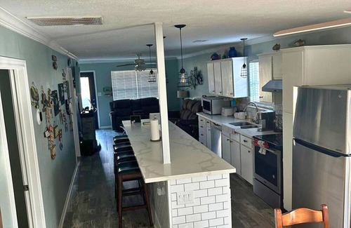 West Livingston Cottage | Serene Lakefront Getaway | Boathouse | Kayaks | Gazebo with Swings