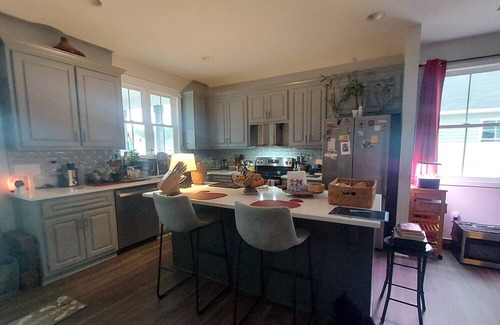 Wilson House | Charming 3 bedroom house in Wilson with AC, WiFi, fitness room, big fenced yard.