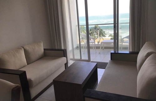 Mount Lavinia Apartment | Enjoy a beautiful sunset from your ocean-view bedroom.