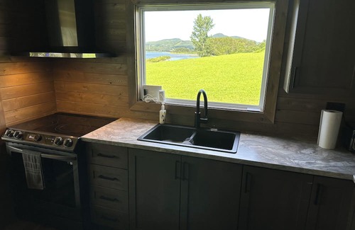 Listuguj Mi'gmaq First Nation Cottage | Cozy cottage located along the Restigouche River, short 10 minute drive to city.