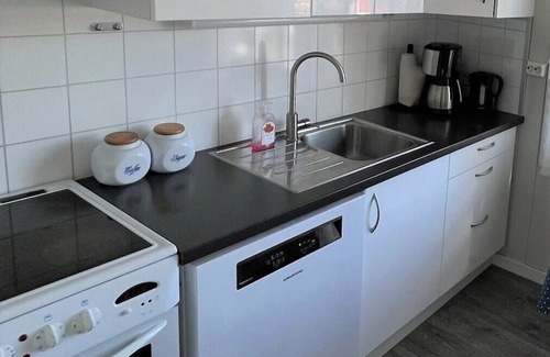 Lindesnes House | Holiday home 'Naversund', reduced price, off the island of Furuholmen near Lindesnes in a secluded location with a view of the fjord, Agder, southern Norway, up to 8 people, 4 bedrooms, 2 shower rooms, 2 WC, 50 m² terrace, Internet WIFI, jetty an.