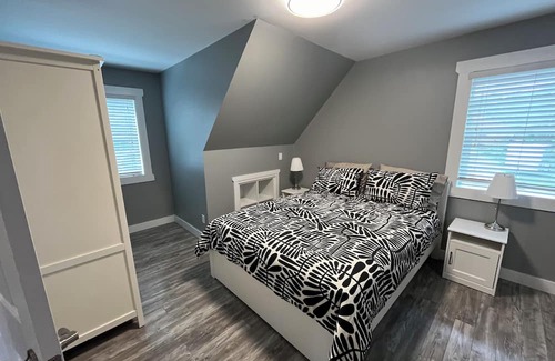 Juan de Fuca Electoral Area Cottage | Modern ocean view suite with large private deck, located on a small hobby farm.