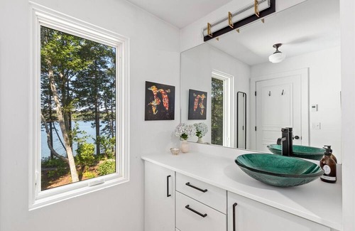 Saint George House | Tranquil Waters Retreat: A Luxurious Scandinavian-Inspired Haven on the Saint