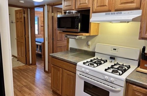 Warrens Cabin | Cozy Cabin. Great yard for fires or grilling! Bring the whole family!