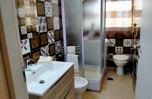Giannella House | Holiday Home 'Residence Giannella - Ginestra 17' with Private Garden and Air Conditioning