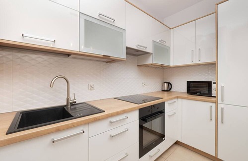 Baluty Apartment | Apartment Manufaktura Łódź by Renters
