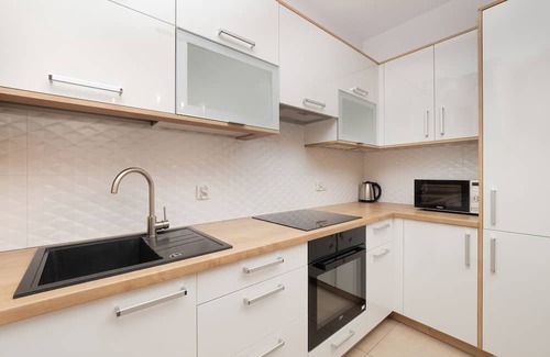 Baluty Apartment | Apartment Manufaktura Łódź by Renters