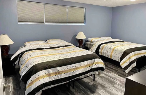 Regina House | 4 Bedroom Spacious House In Regina! Close to downtown & Mosaic Stadium.