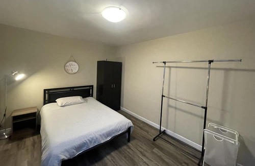 Toronto Apartment | Unit 4D - Large Bedroom with private bathroom, work desk, WI-FI and parking