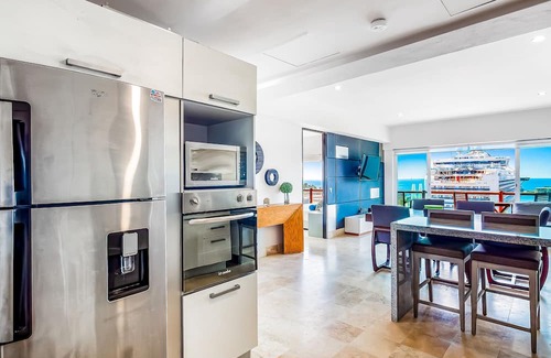 Palmar de Aramara Condo | 8th-floor ocean-view condo with balcony, outdoor pool, gym, washer/dryer, & AC