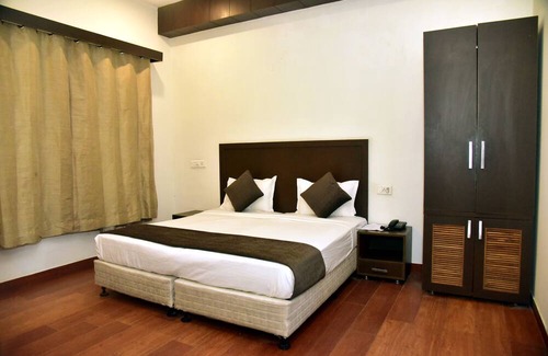 Sector 15 Hotel | Homefort Stays - 32 Avenue - Udyog Vihar