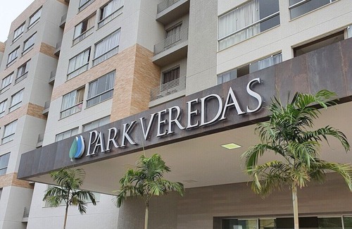Pousada do Rio Quente Apartment | Resort Park Veredas with the warm river in the background