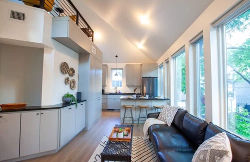 North Loop House | Stylish 3 story house. 3 patios. Central Austin.